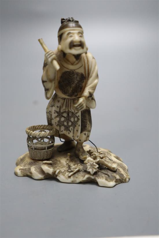 A fine Japanese ivory okimono of Ebisu, Meiji period, two character mark to a red lacquer seal, height 8cm